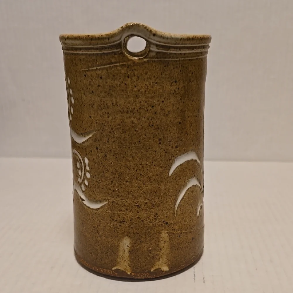 Brown Signed Pottery Vase with White Floral Design